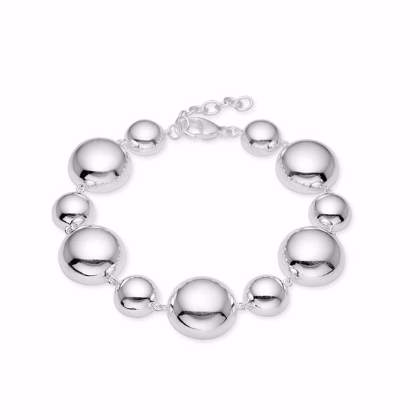 Silver bracelet with polished half-spheres, varying sizes, reflective finish, and a clasp.