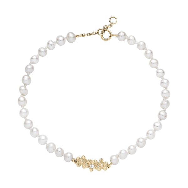 Bracelet with freshwater pearls, gold floral clasp, and zirconia stone on a white background.