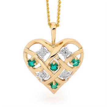 Gold heart pendant with 4 x 0,005 ct diamond and 4 x emerald