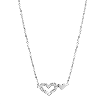 Sterling silver necklace with pavé heart and solid heart pendants on a fine link chain.