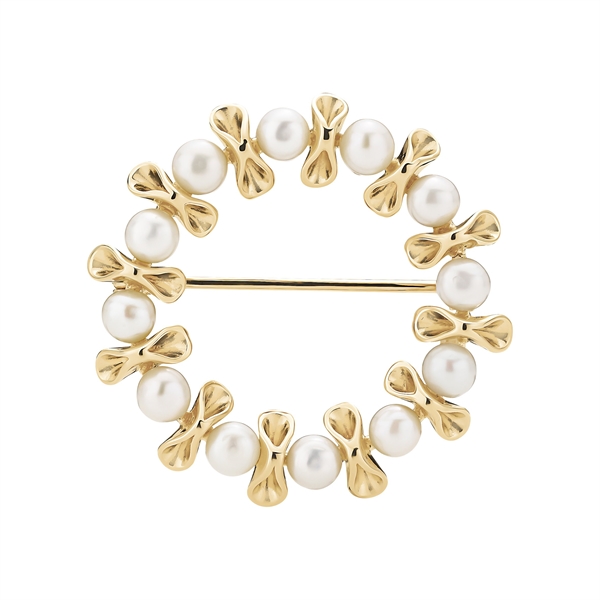 Circular brooch with alternating white pearls and gold bow shapes, featuring a pin on the back.