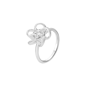 Sterling silver ring with flower-shaped loops and a central clear stone on a polished band.
