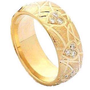 14 carat gold ring with 3 x brilliant hearts and rough pattern