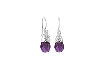 Teardrop purple gemstone earrings with decorative metallic components above the faceted stones.