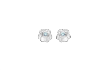Silver pansy-shaped earrings with light blue central stones and petal-like details surrounding them.