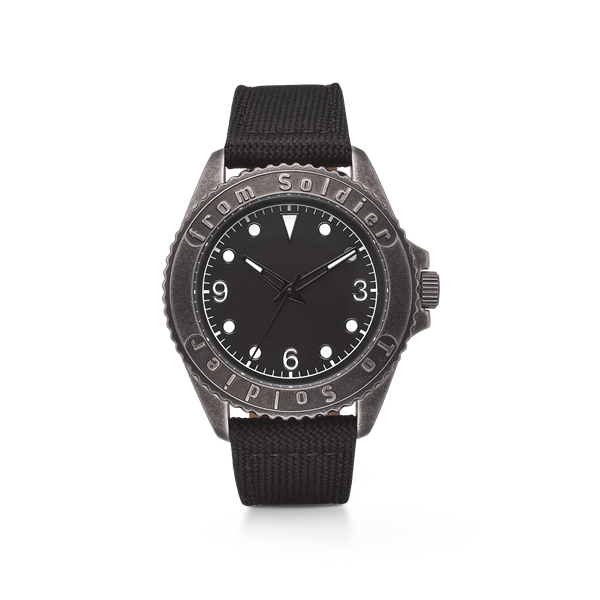 Black canvas strap watch with "from Soldier to Soldier" engraved bezel and white markers.