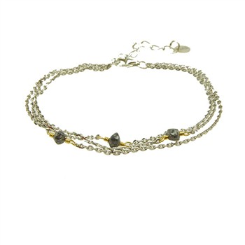 Three-strand bracelet with dark stones, silver and gold tones, and an adjustable chain with charm.