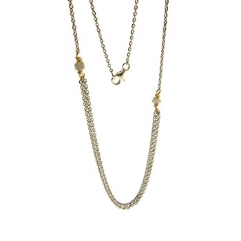 Necklace with mixed metals, two grey stones, and triple-strand chain on white background.