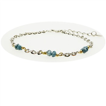 Mixed metal chain bracelet with raw blue-green stones and adjustable loop clasp.