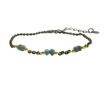 Black chain bracelet with blue-green stones, gold links, and extension chain.