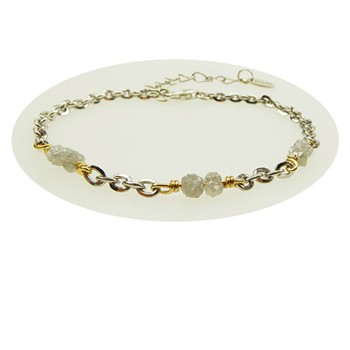 Two-tone bracelet with silver links, gold accents, grey rough stones, and an adjustable extension chain.