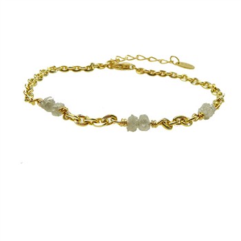 Gold chain bracelet with three grey stone clusters and extension chain with small tag.
