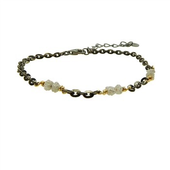 Dark chain bracelet with grey raw diamonds, gold accents, and adjustable extension chain.
