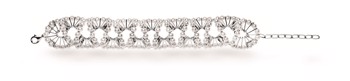 Sterling silver bracelet with cultured pearls and rhodium plating, detailed pattern.
