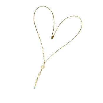 Delicate chain necklace in a heart shape with white pearls and a blue topaz stone at the bottom.