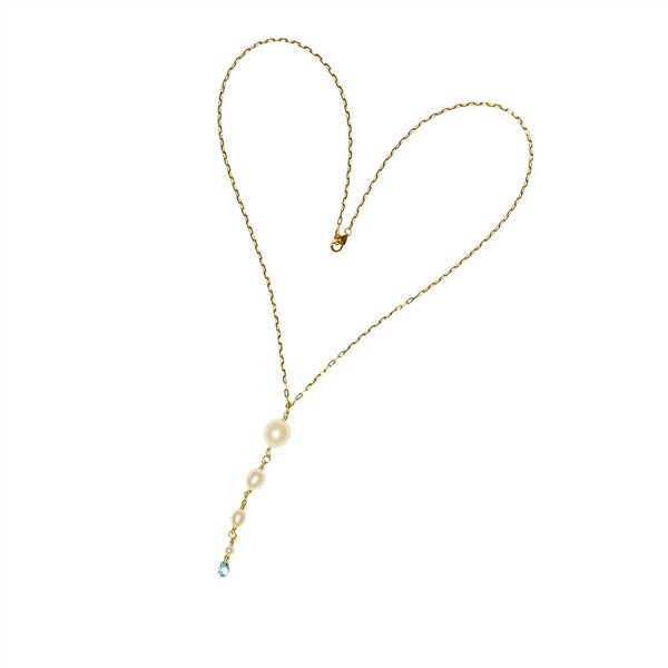 Gold chain necklace with heart shape, pearl, and blue topaz pendant on white background.