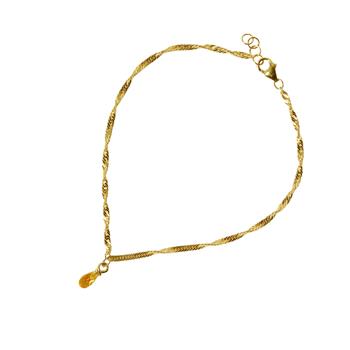 Gold bracelet with twisted rope chain, teardrop citrine pendant, and adjustable clasp.
