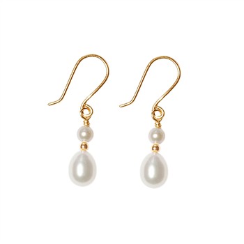 Gold dangle earrings with small round and larger teardrop pearls, featuring hook fastenings.