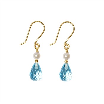 Gold hooks with white pearls and blue teardrop gemstones dangle elegantly.
