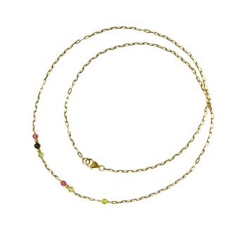 Gold chain necklace with pink, red, yellow, green beads and lobster clasp on white background.
