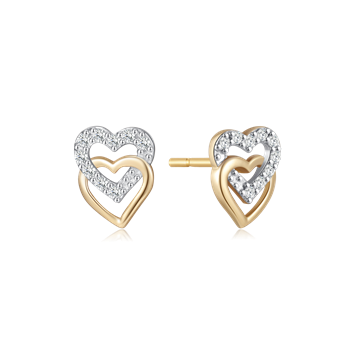 Heart-shaped gold earrings with dual-heart design, textured outer heart, and stud style posts.