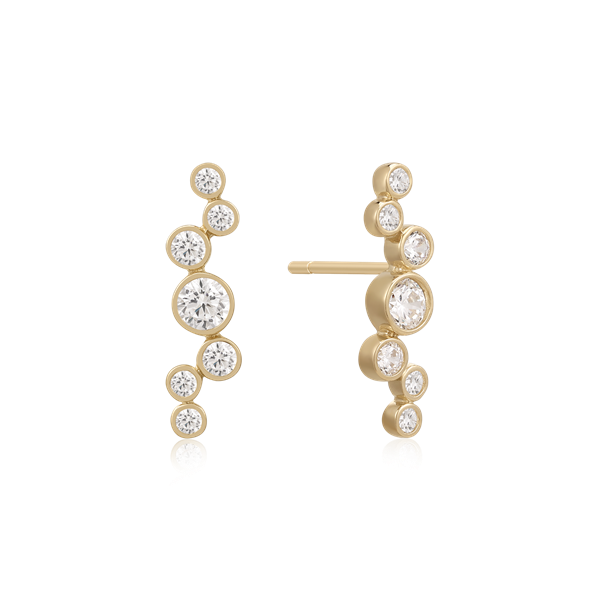 Gold earrings with clear, round stones in a vertical line, featuring a larger center stone.