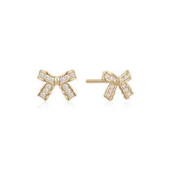 Gold bow-shaped earrings with sparkling stones and posts for attachment from Støvring Design.