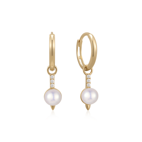 Gold hoop earrings with dangling stones and a round white bead at the bottom from Støvring Design.