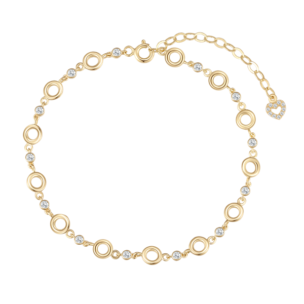 Gold bracelet with circular links, gemstones, adjustable chain, and heart charm.