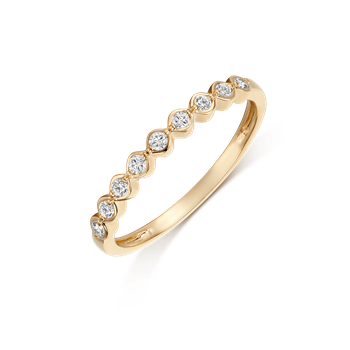 Gold ring with evenly spaced round stones on top half, smooth shiny finish, by Støvring Design.