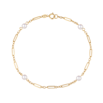Gold bracelet with chain links, four white beads, and a clasp for fastening.