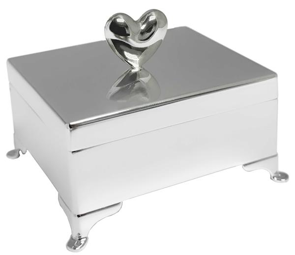 Silver jewelry box with heart handle, reflective surface, and four ornate legs.