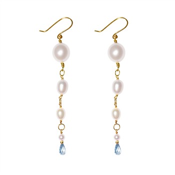 Drop earrings with white pearls, blue topaz, and 9kt gold wires.