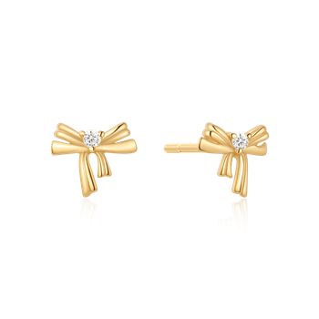 Gold bow-shaped earrings with center gemstone from Støvring Design.