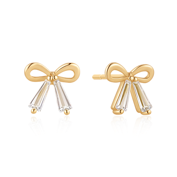 Gold bow-shaped earrings with clear dangling stones and stud posts.