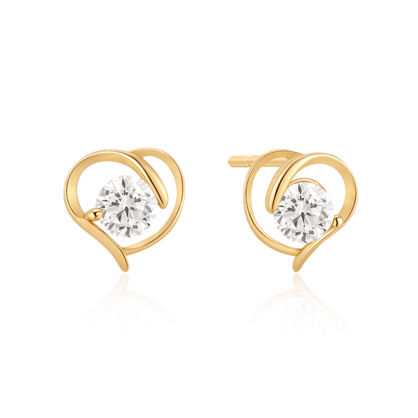 Gold swirl earrings with central sparkling gemstones, reflecting light on a white background.