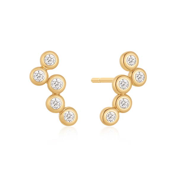 Gold-toned earrings with five circular elements, each featuring a central clear stone.