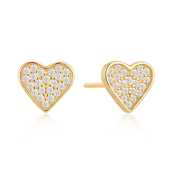 Gold-plated heart-shaped earrings with sparkling stones, reflecting light on a white background.