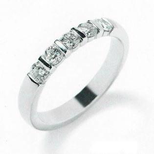 14 carat eternity ring with wide ring in both white and yellow gold