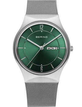 Green dial watch with day-date display, minimalist design, and mesh strap.