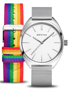 Bering watch with white face, silver mesh band, and optional rainbow strap. Minimalist design.