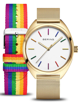 Gold-tone watch with a white dial, rainbow markers, and a fabric strap with "BERING" on the buckle.