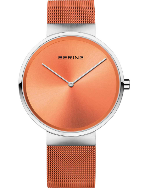 Orange sunburst dial watch with minimalist design, orange mesh strap, and a crown on the right side.