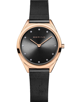 Black gradient watch face with rose gold case, minimalist markers, and fine black mesh strap.