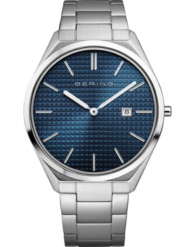 Bering 17240-707 watch with blue grid face, metal bracelet, and date at 3 o'clock.