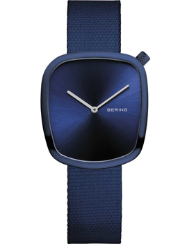 Square watch with rounded edges, deep blue sunburst face, textured blue strap, silver hands.