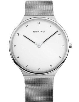 Minimalist white-faced watch with black markers, slim metallic mesh strap, and sleek silver case.