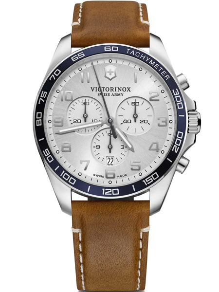 Victorinox watch with brown leather strap, silver dial, chronograph sub-dials, and tachymeter bezel.