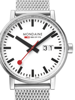 Mondaine watch with white dial, black hands, red second hand, date window, and mesh strap.