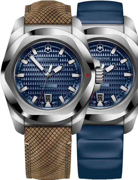 Victorinox I.N.O.X. watch with blue dial, brown textured and blue straps, luminescent hands, date at 6.